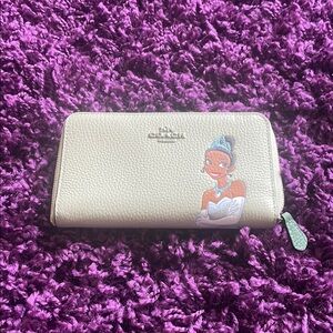 Disney’s Tiana wallet by Coach